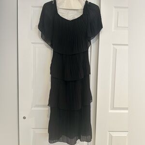 Off the shoulder, black tiered pleated dress